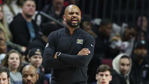 Dec 30, 2022; Piscataway, New Jersey, USA; Coppin State Eagles head coach Juan Dixon reacts during the first half against the Rutgers Scarlet Knights at Jersey Mike's Arena.